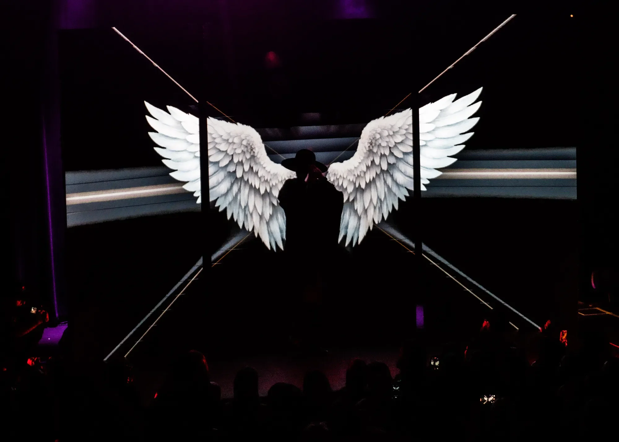 WITCHZ hands to crowd